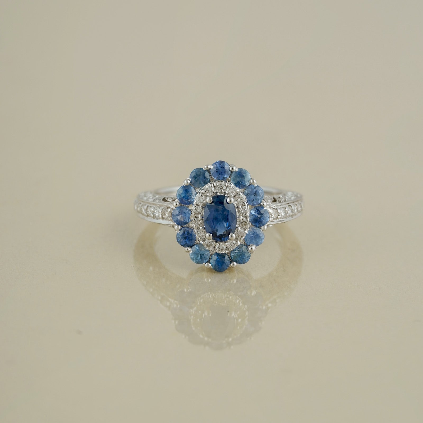Gold Diamond and Halo Sapphire Engagement Ring