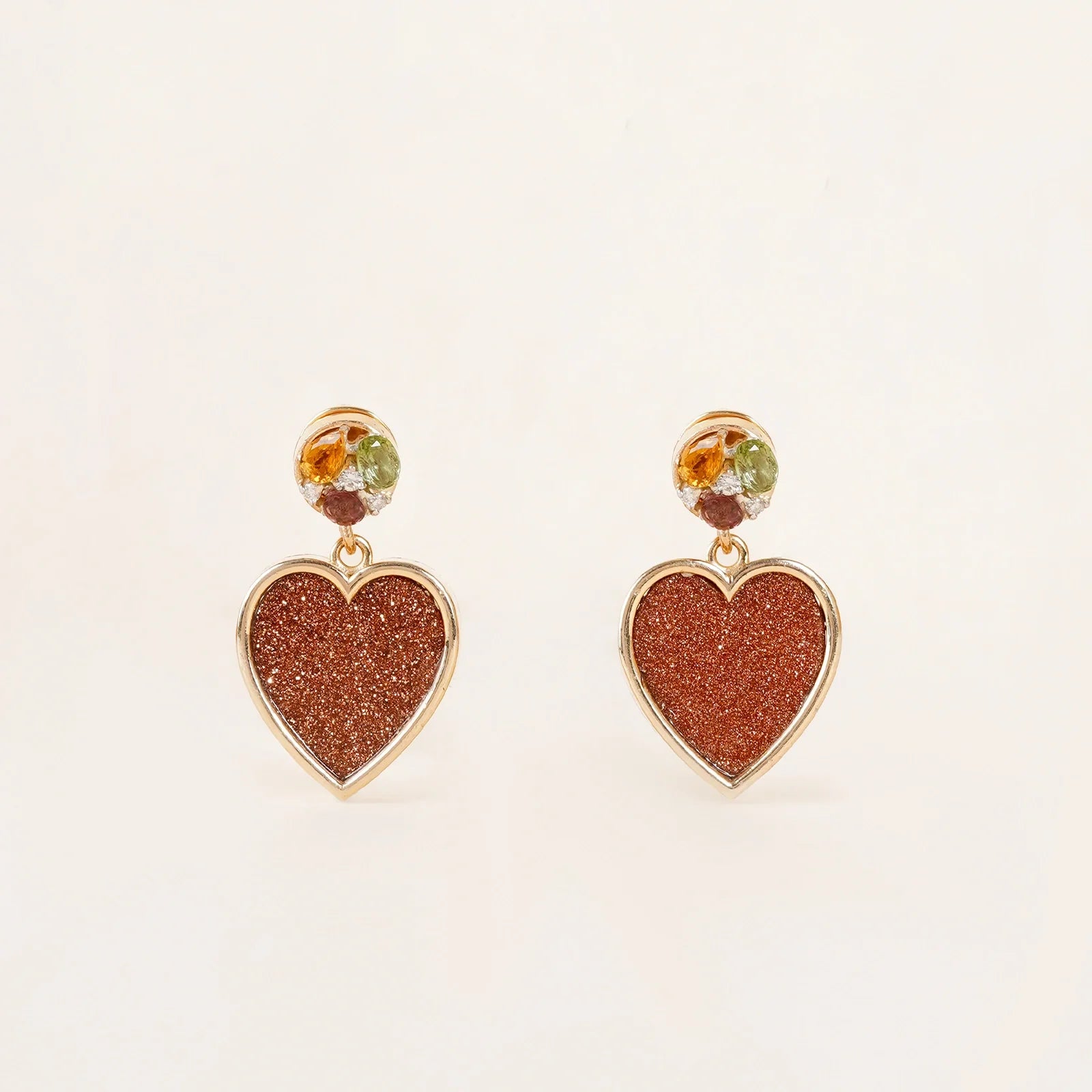 Belov Earrings in 14K gold with heart-shaped sunstone, tourmaline accents and natural diamond detailing.
