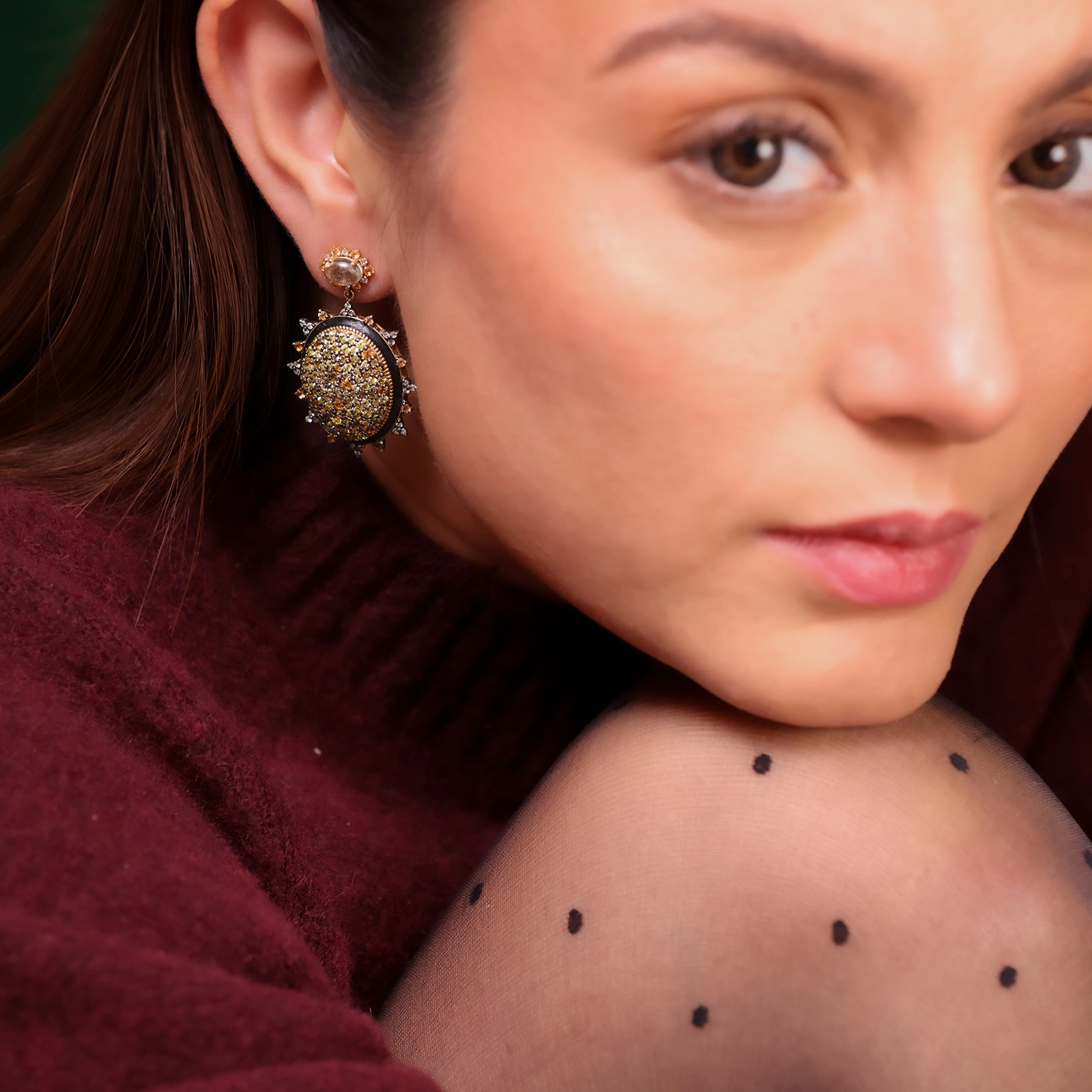 Sunburst earrings featuring pavé sapphires in warm, sun-kissed hues with faceted Green Amethyst stud tops.