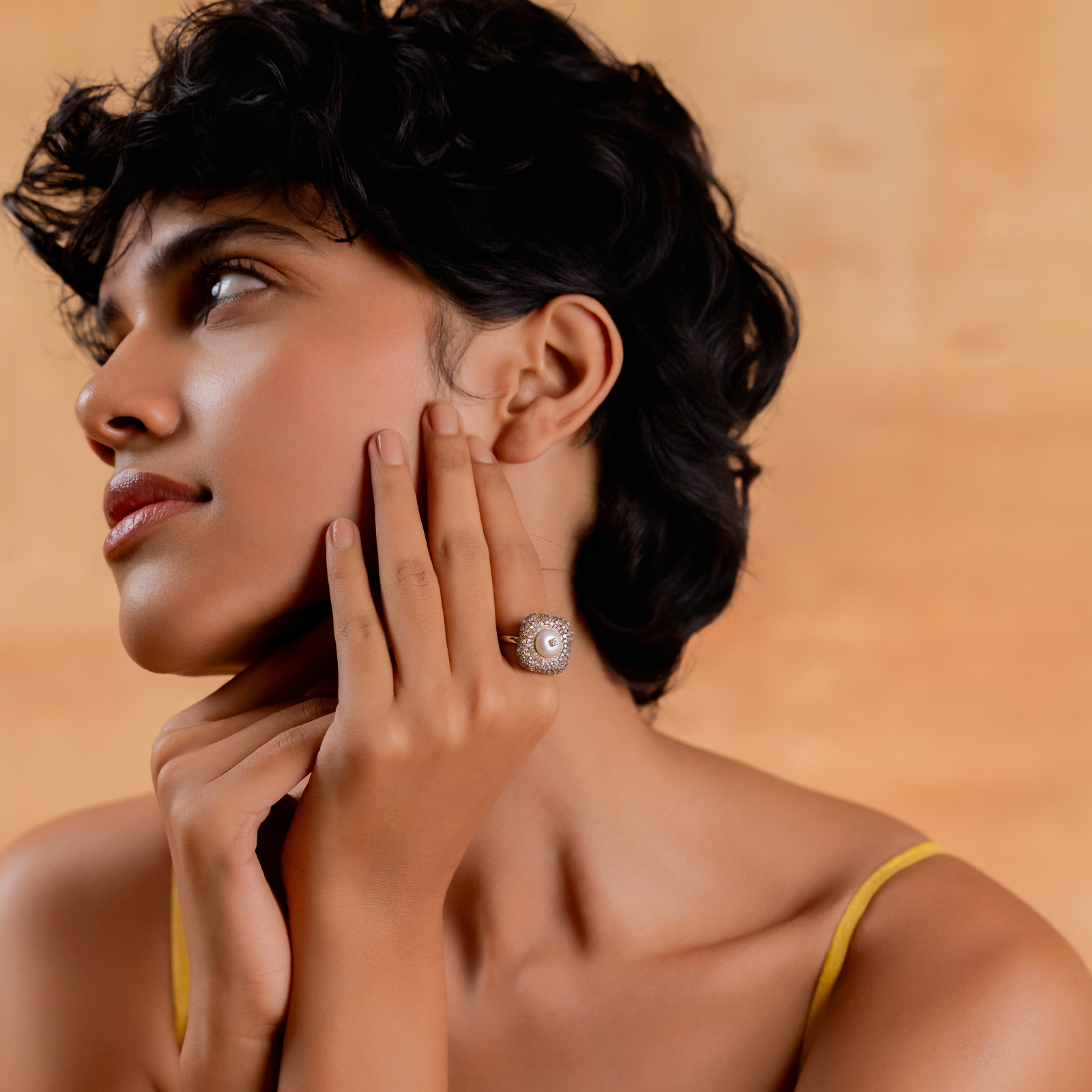 Gwen Ring in 14K gold and 925 silver with cultured pearl centre, natural rose-cut diamonds, sapphires and black enamel