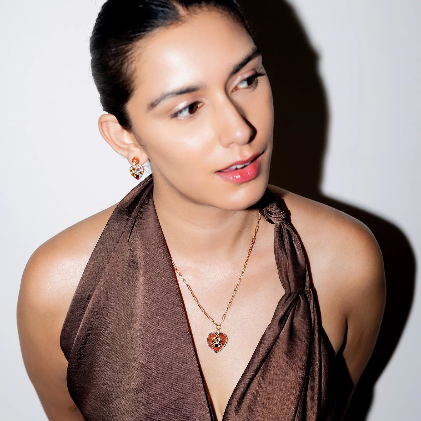 Belov Necklace in 14K gold with heart-shaped sunstone, tourmaline accents and natural diamond detailing.