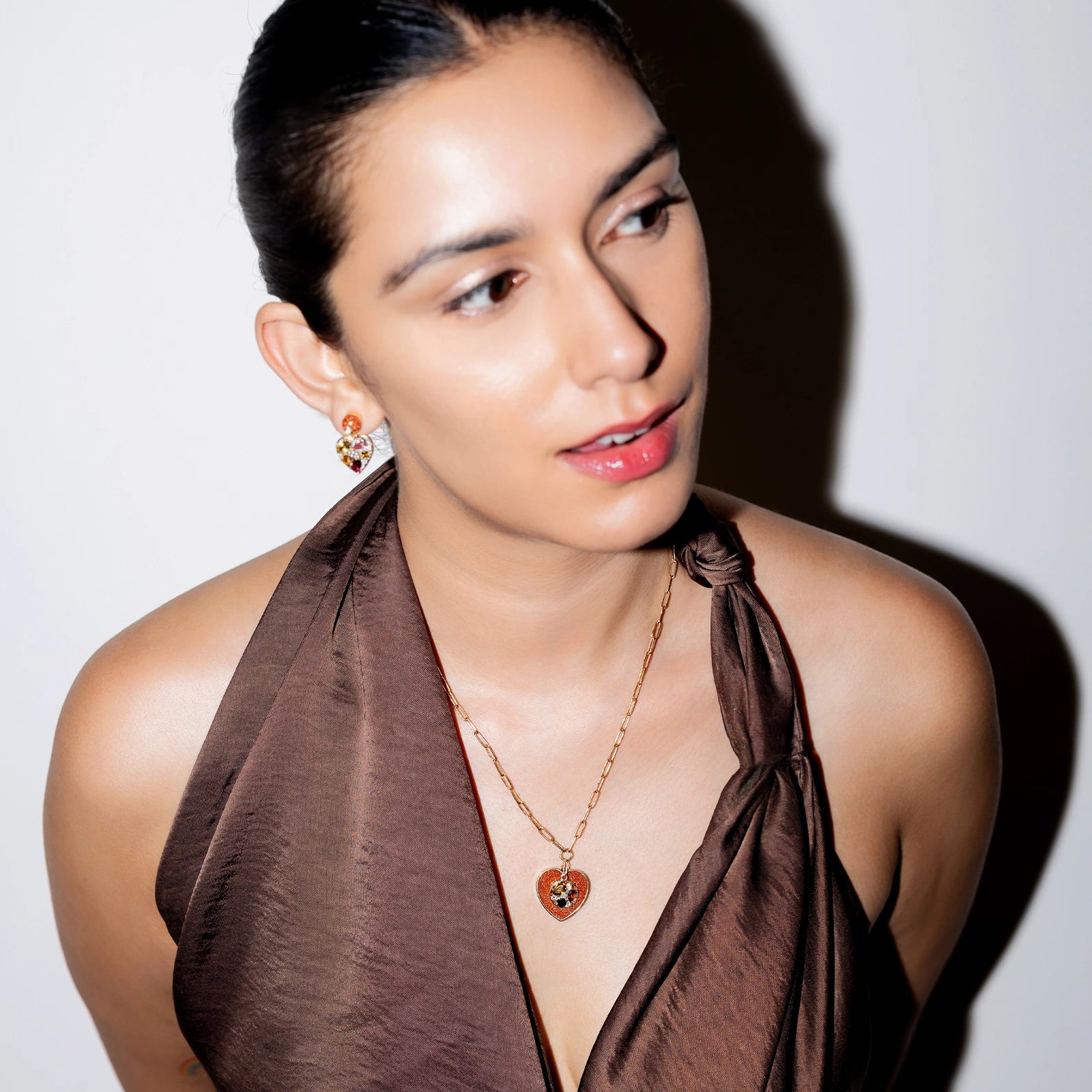 Belov Necklace in 14K gold with heart-shaped sunstone, tourmaline accents and natural diamond detailing.