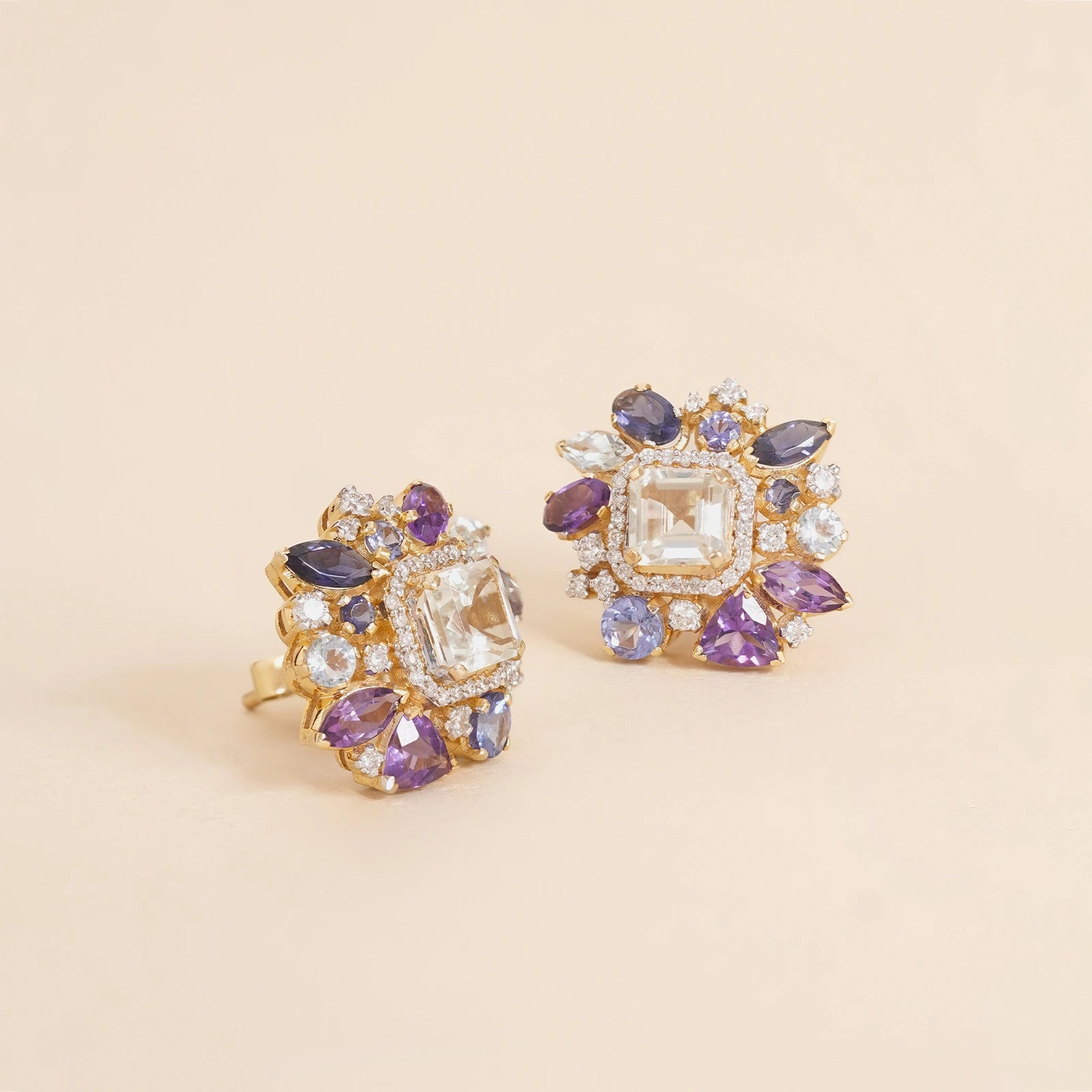 Gold Viola studs with green amethyst tanzanite and blue topaz gemstones.